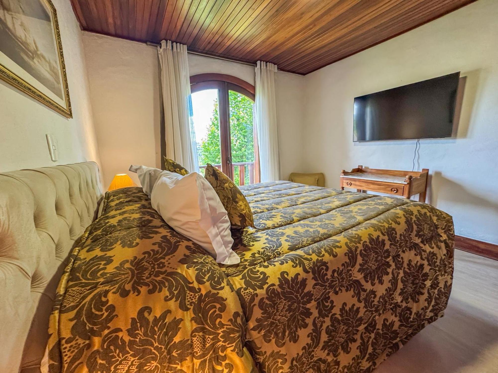 Mansao Nacional Inn Кампус-ду-Жордау Экстерьер фото